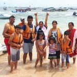 family group from India at water sport beach - Mari Bali Tours
